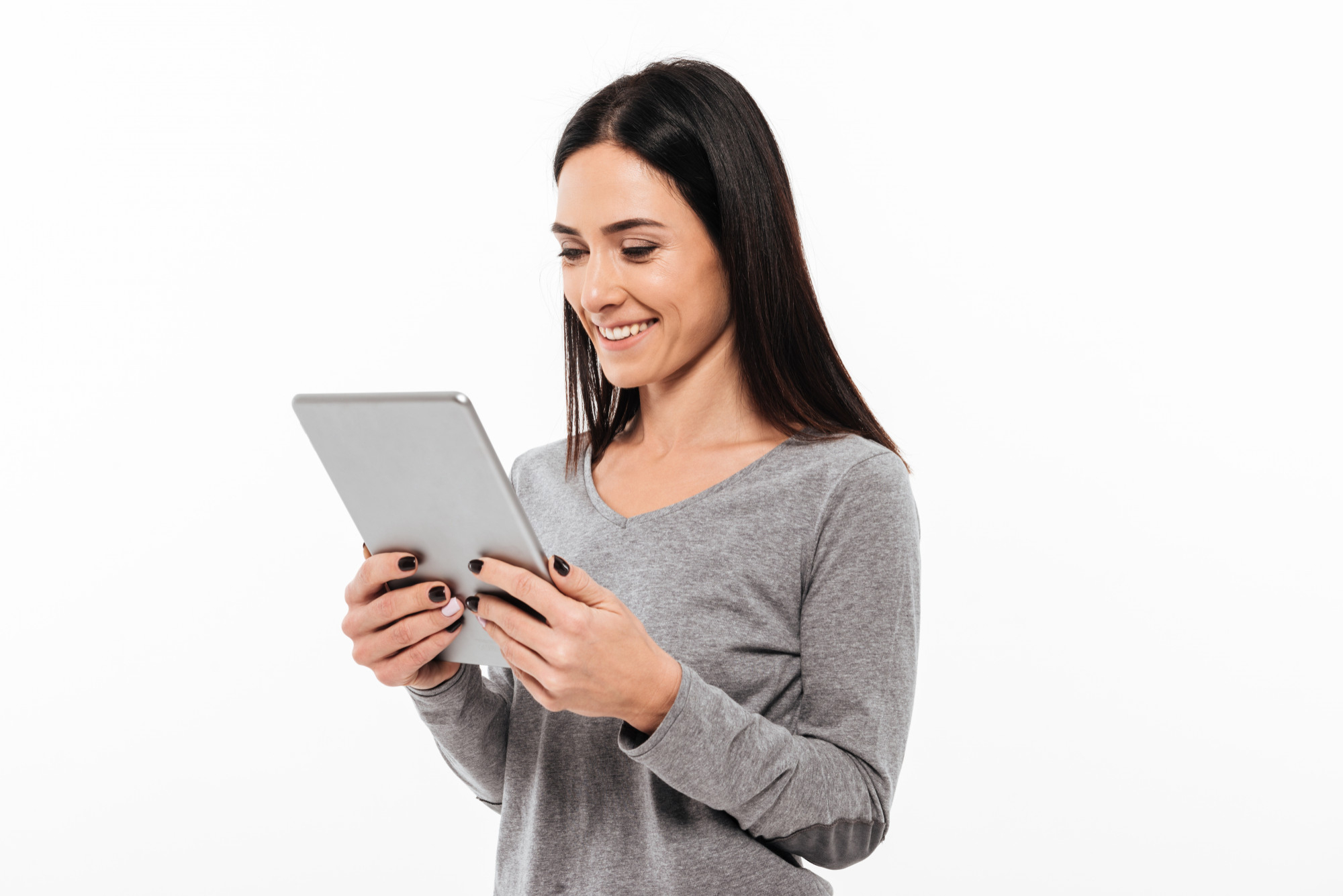 happy-woman-standing-isolated-using-tablet-computer